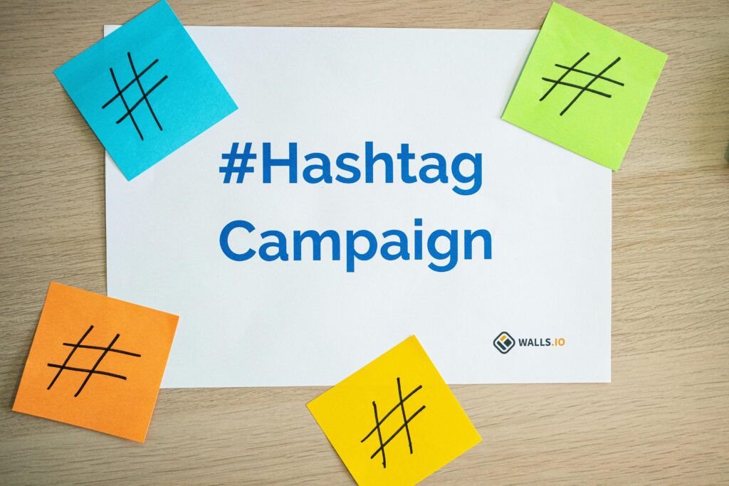 pexels-photo-15635399-15635399 Colorful sticky notes arranged around a hashtag campaign sign, ideal for social media marketing concepts.